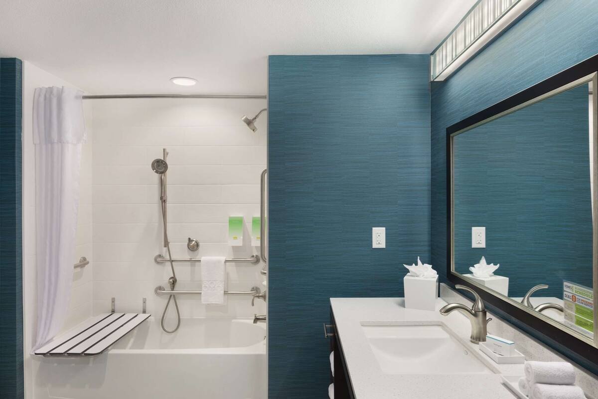 studio suite, 1 king bed, accessible (hearing) | bathroom | free toiletries, hair dryer, towels