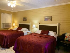 Standard Room, Multiple Beds, Non Smoking | In-room safe, desk, soundproofing, iron/ironing board