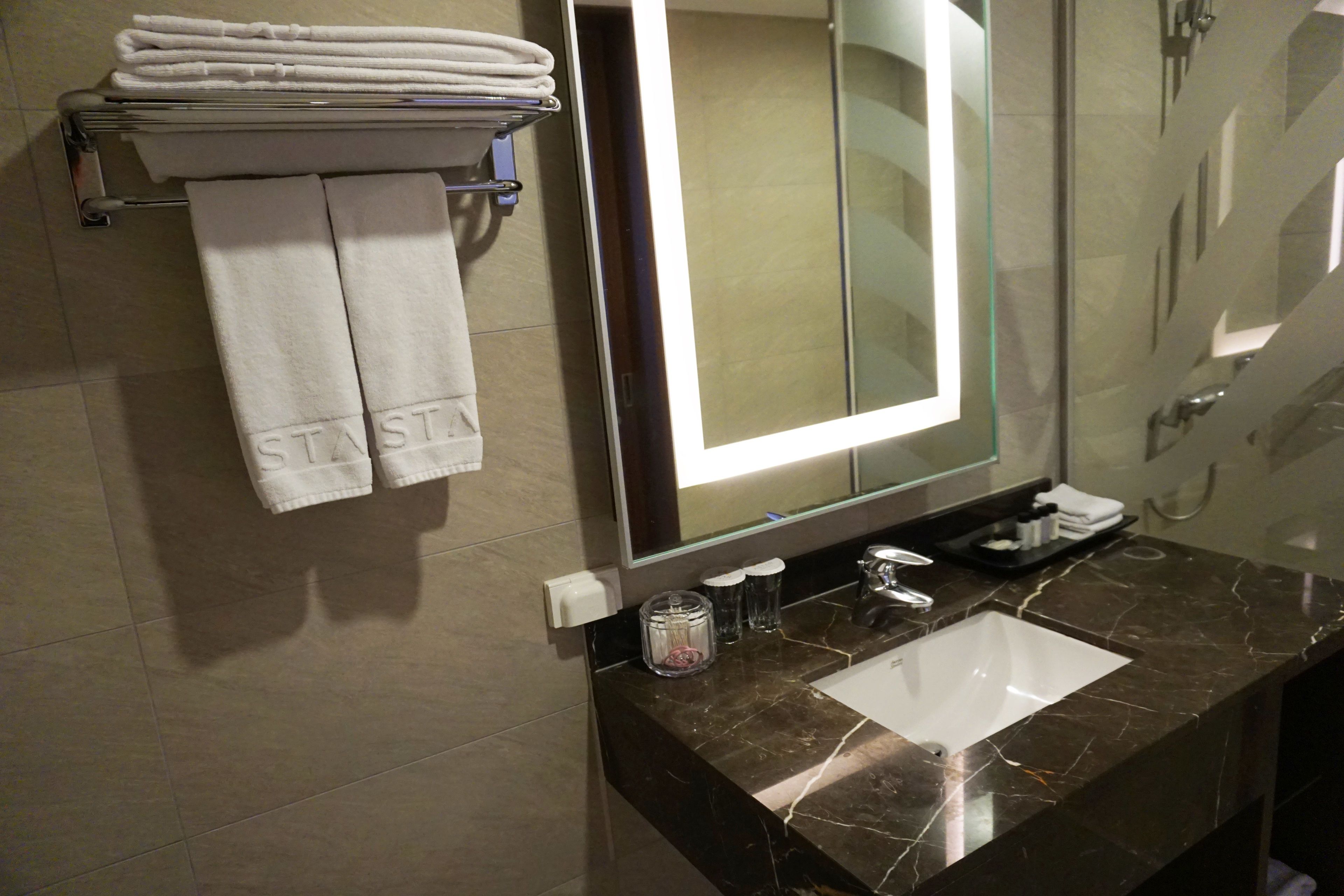 shower, hair dryer, bathrobes, slippers