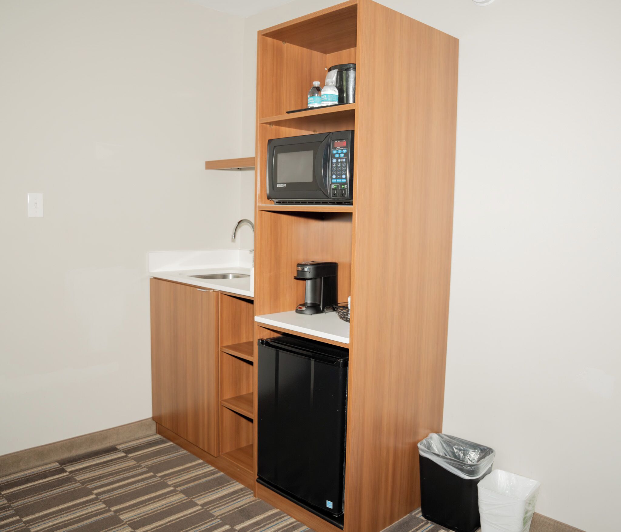 premium bedding, pillow-top beds, desk, laptop workspace