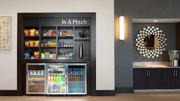 A vending machine labeled "In A Pinch" with snacks and drinks.