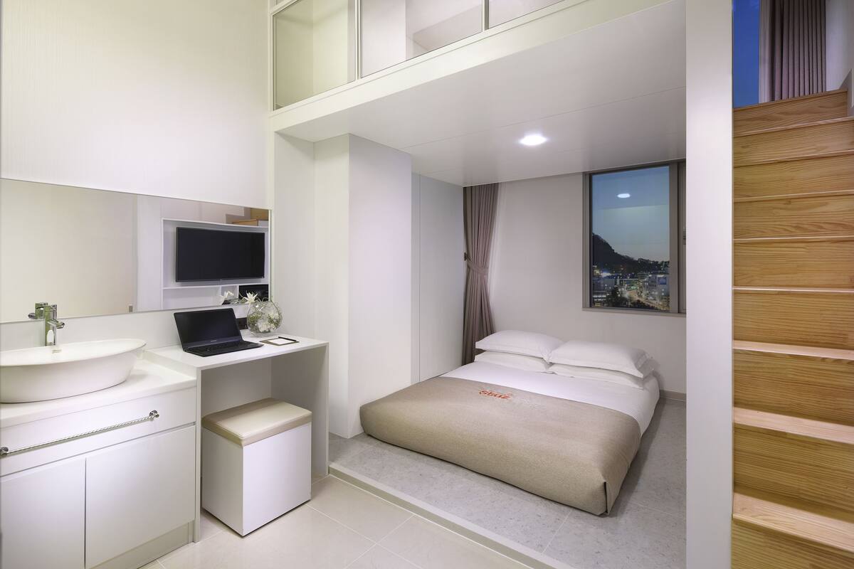 Duplex Family Room - Parking Not available | Premium bedding, down comforters, pillowtop beds, in-room safe