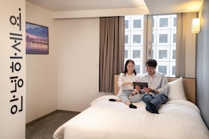 Premium bedding, down duvets, pillow-top beds, in-room safe