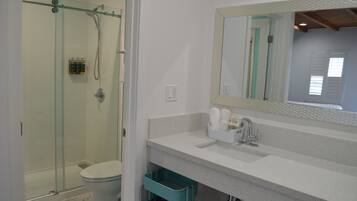 Deluxe Room, Multiple Beds | Bathroom | Shower, free toiletries, hair dryer, towels