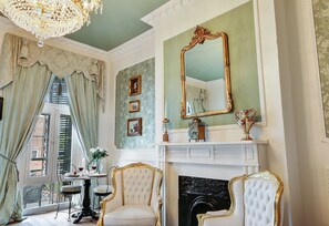  Dauphine Suite | Living area | Flat-screen TV - French Quarter Mansion (New Orleans)