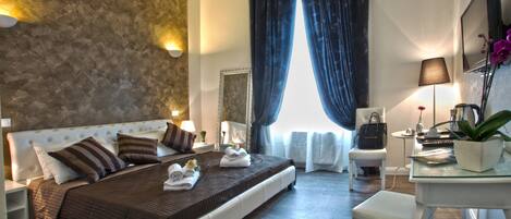 Superior tweepersoonskamer | Een minibar, een kluis op de kamer, gratis babybedden, gratis wifi