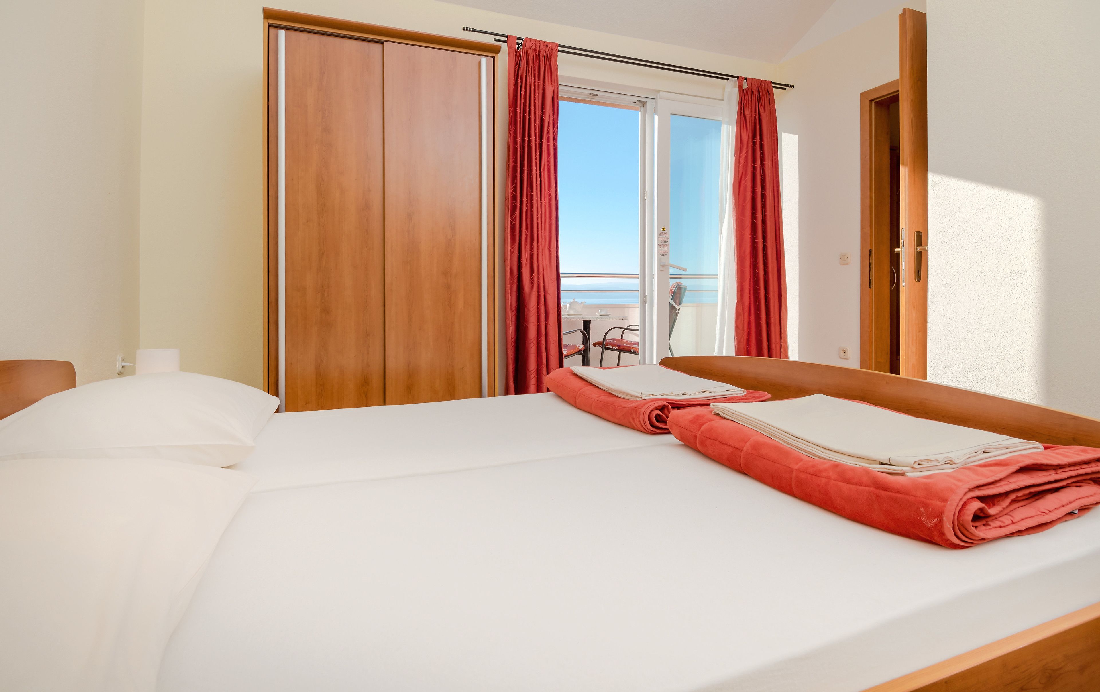 Deluxe Apartment, 1 Bedroom, Balcony, Sea View (3-5) | Hypo-allergenic bedding available, in-room safe, iron/ironing board