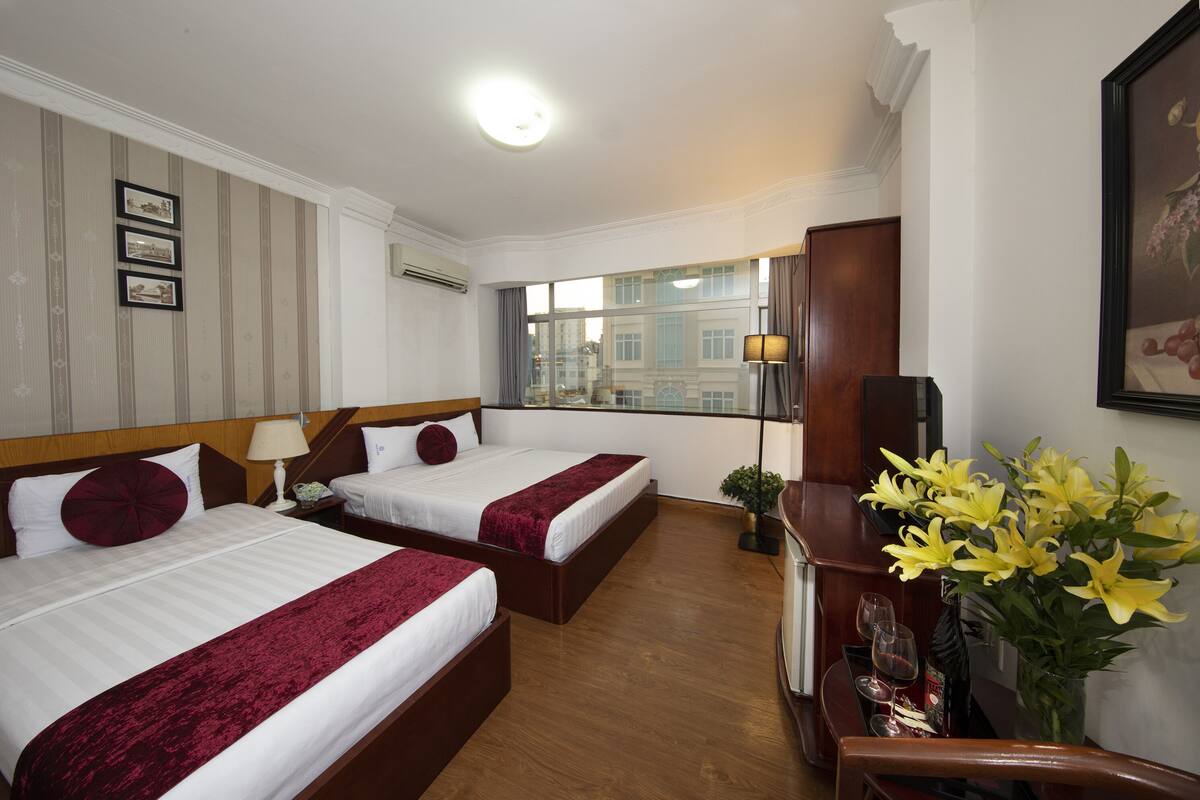 Executive Triple Room, City View | Premium bedding, memory-foam beds, minibar, in-room safe