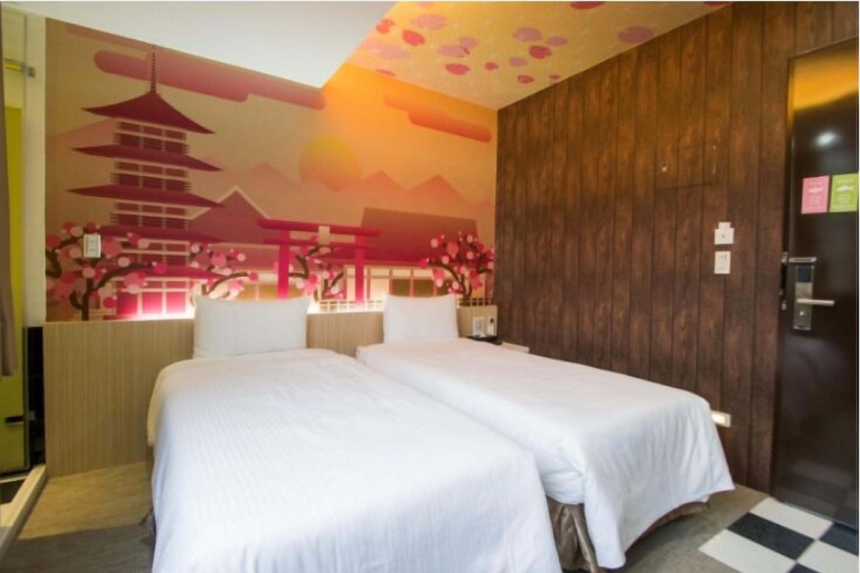 deluxe twin room | individually decorated, blackout curtains, free wifi, bed sheets