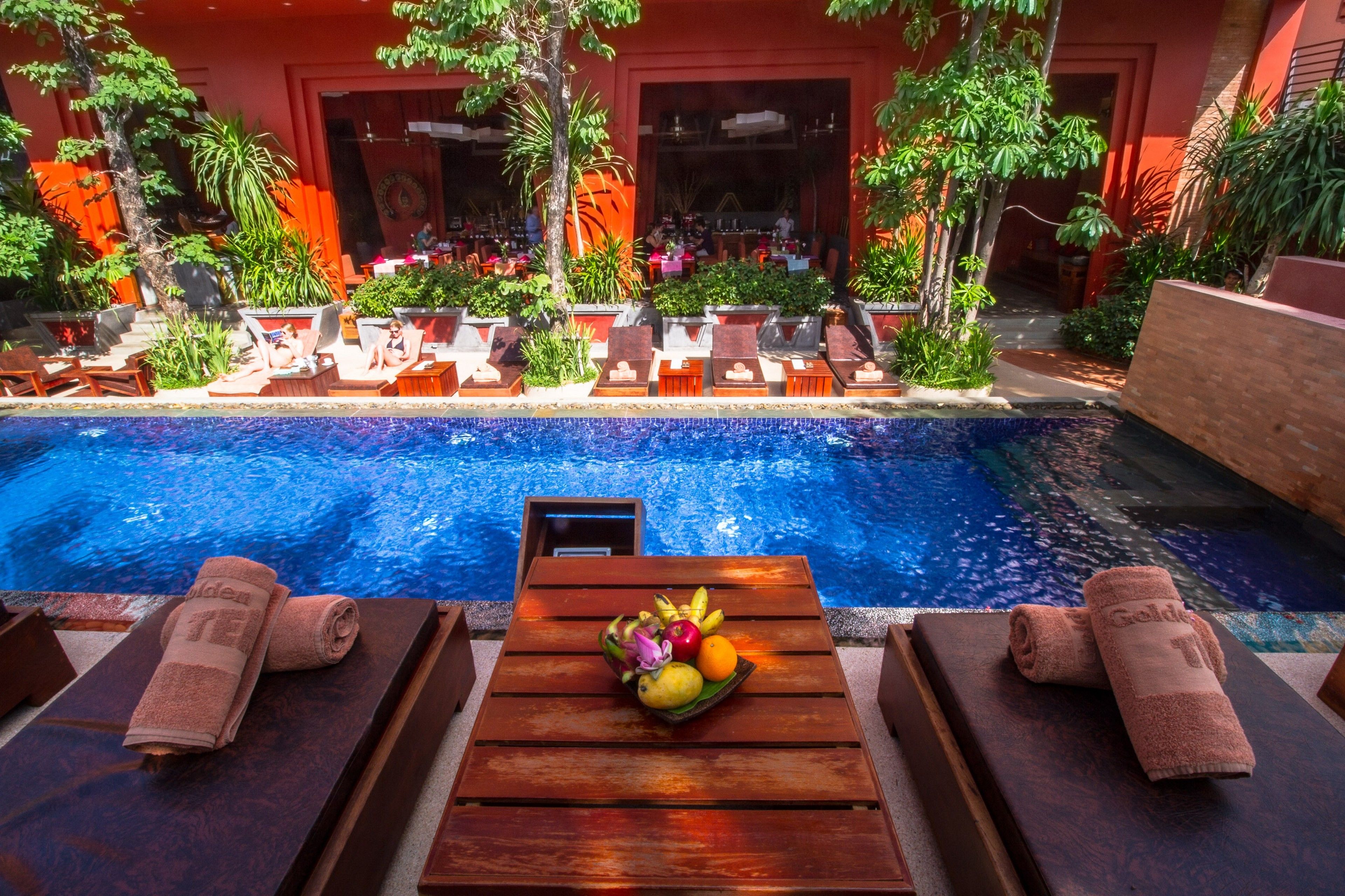 outdoor pool, open 9:00 am to 6:00 pm, pool umbrellas, pool loungers