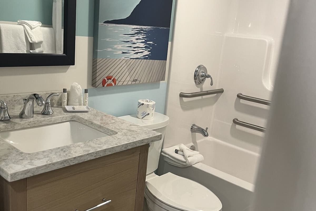 atrium king limited ocean view | bathroom | hair dryer, towels