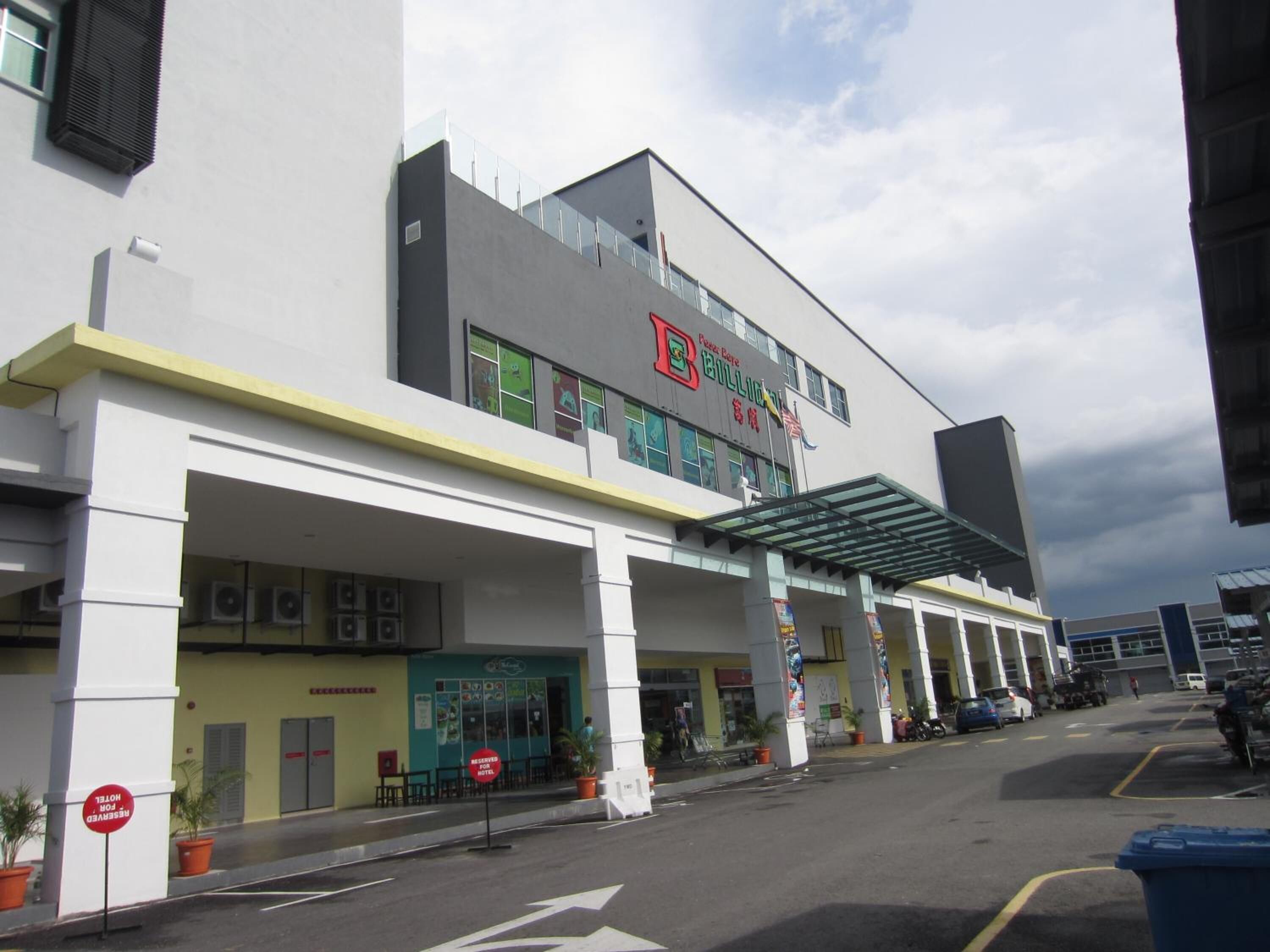 A building with a large sign reading "Post Office" and "Hotel".