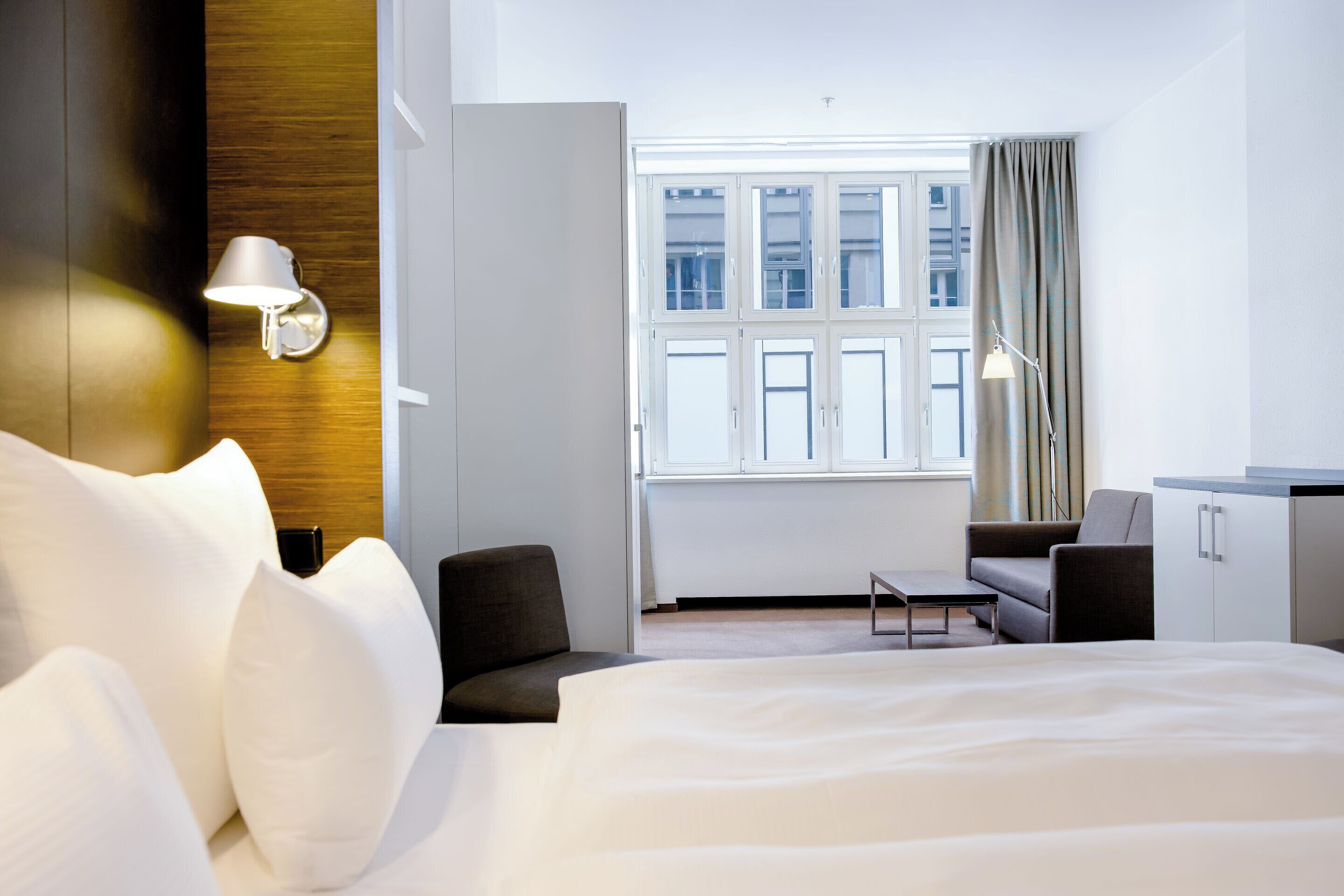 Deluxe Room (2 Adults + 1 Child) | Desk, soundproofing, free WiFi, bed sheets