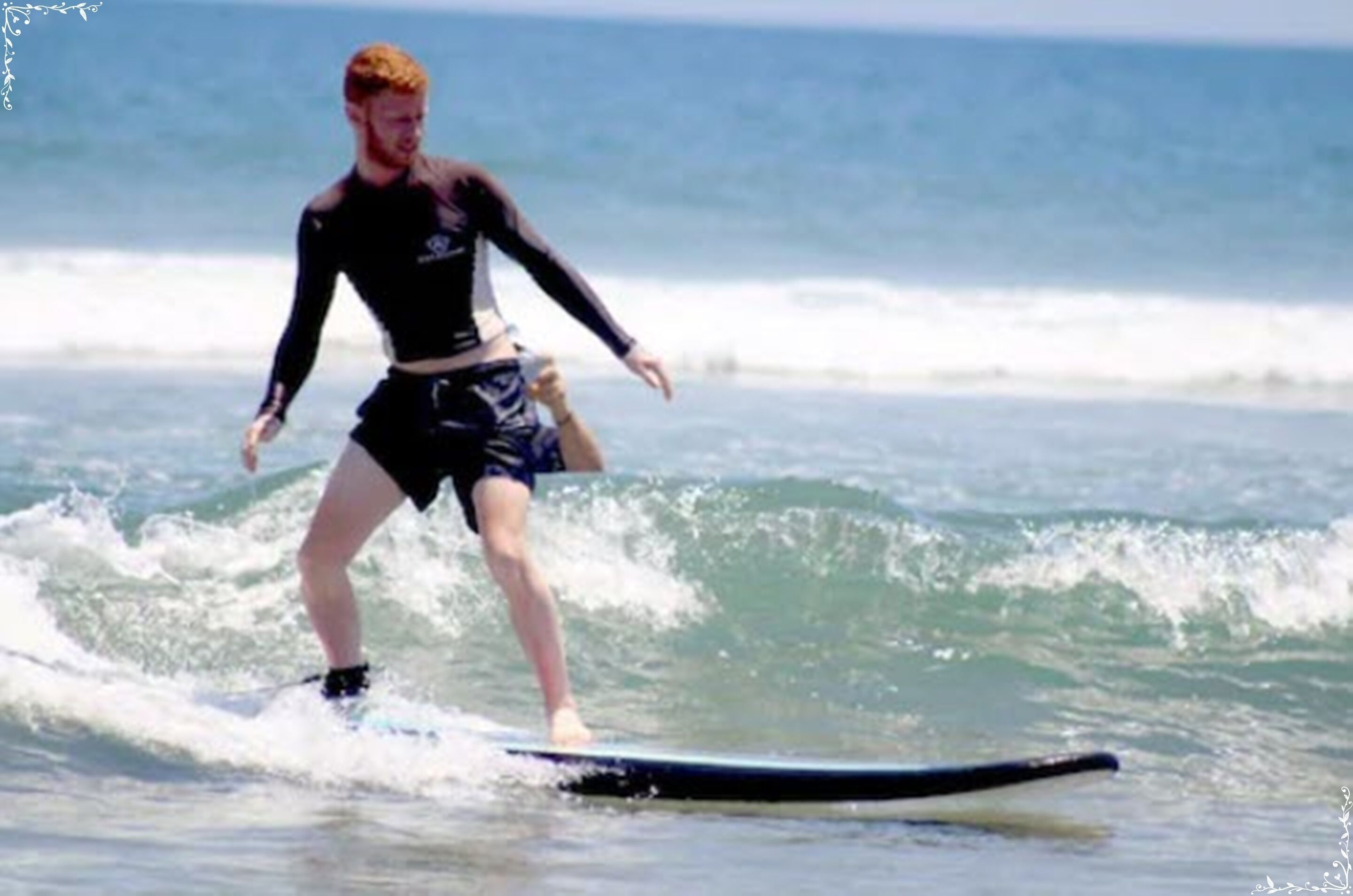 A person surfing on a wave.