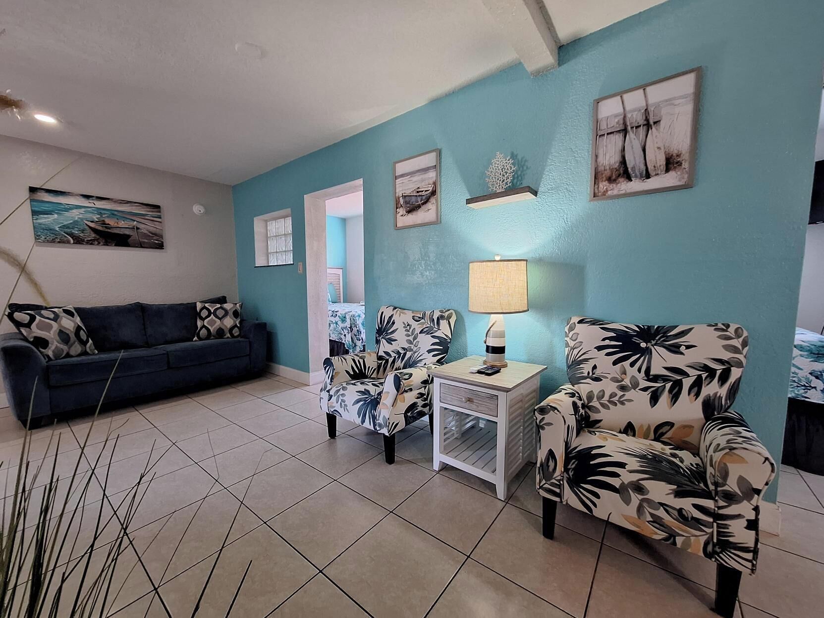 Room, 2 Bedrooms | Living area | Flat-screen TV