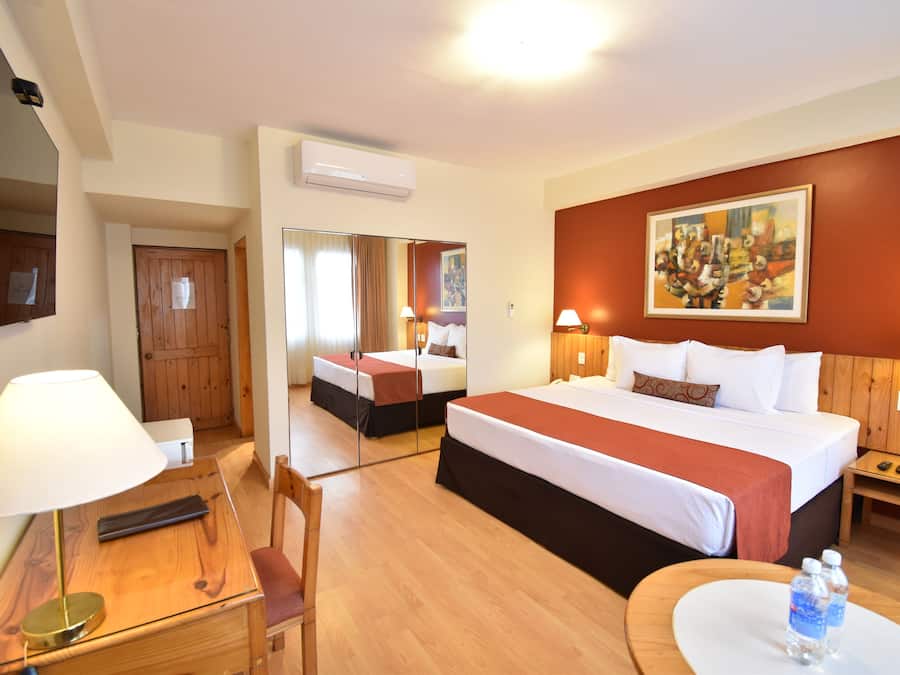 Habitación doble ejecutiva | Ropa de cama de alta calidad y minibar