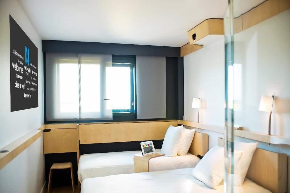 Blackout drapes, soundproofing, cribs (free), WiFi (free)