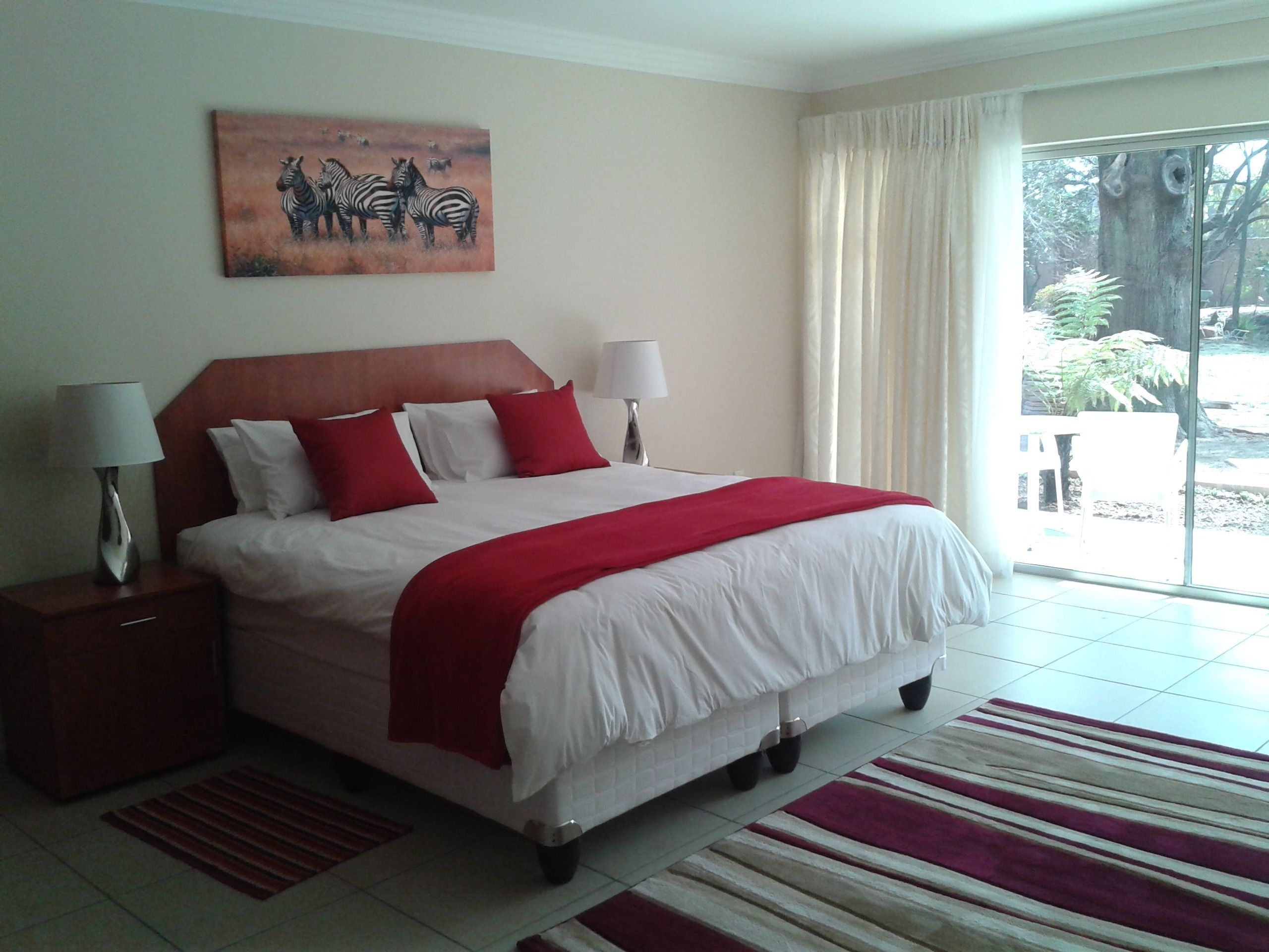 Desk, laptop workspace, blackout curtains, iron/ironing board