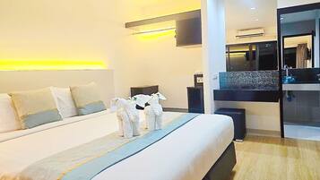 ห้องดีลักซ์ | 1 ห้องนอน, ตู้นิรภัยในห้องพัก, โต๊ะทำงาน, พื้นที่ทำงานแบบใช้แล็ปท็อป