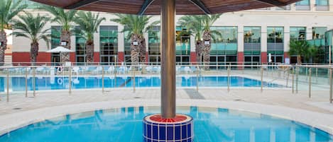 Seasonal outdoor pool, pool umbrellas, pool loungers