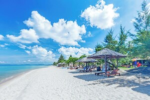 On the beach, kayaking