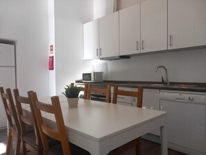 Apartment, 3 Bedrooms | Private kitchen | Fridge, microwave, oven, stovetop