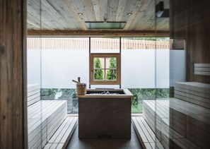Sauna, hot tub, steam room, hot stone massages, body scrubs, facials