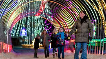 A tunnel with colorful lights and decorations.