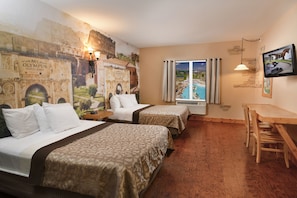 Desk, iron/ironing board, bed sheets - Mt. Olympus Water & Theme Park Resort (Wisconsin Dells)