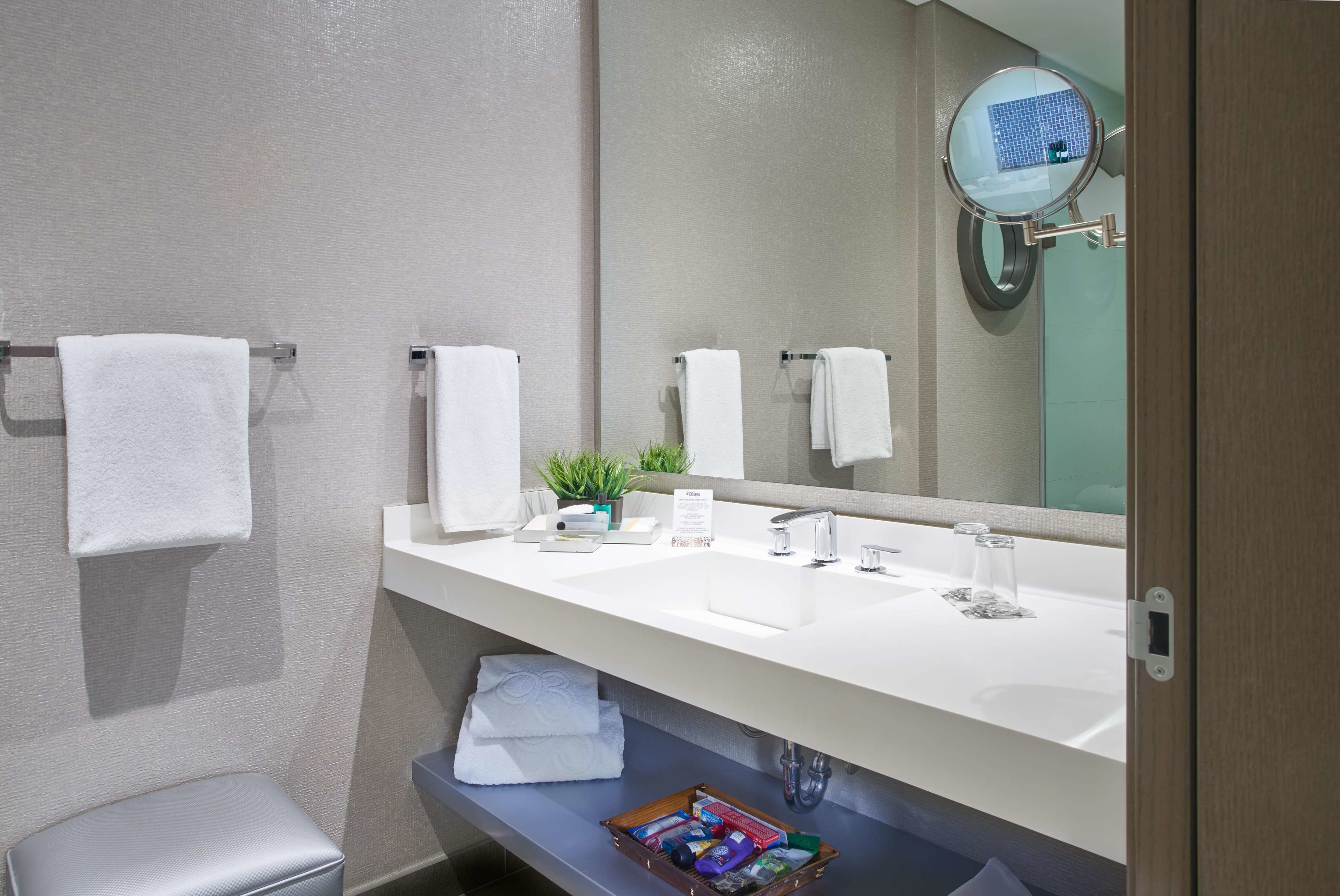 shower, hair dryer, bathrobes, towels