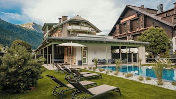 Indoor pool, seasonal outdoor pool, pool umbrellas, sun loungers