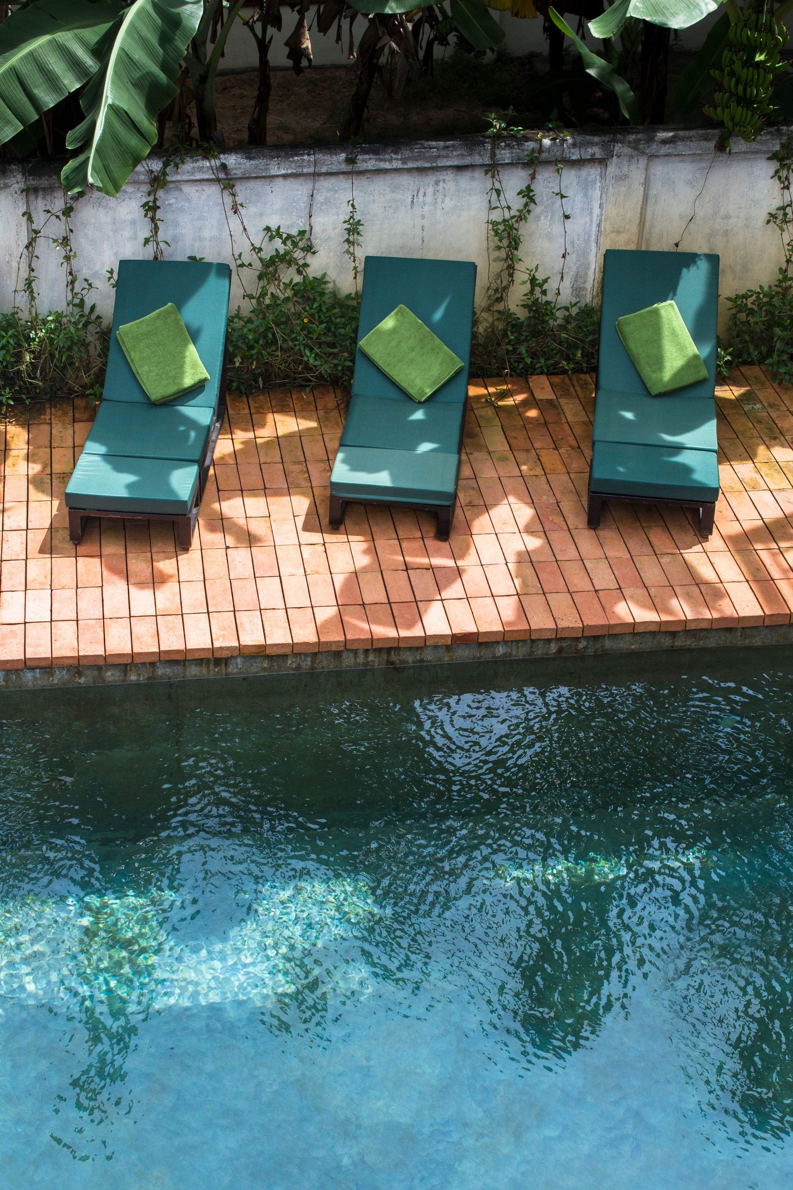 outdoor pool, pool loungers