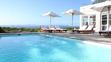 Outdoor pool, pool umbrellas, pool loungers