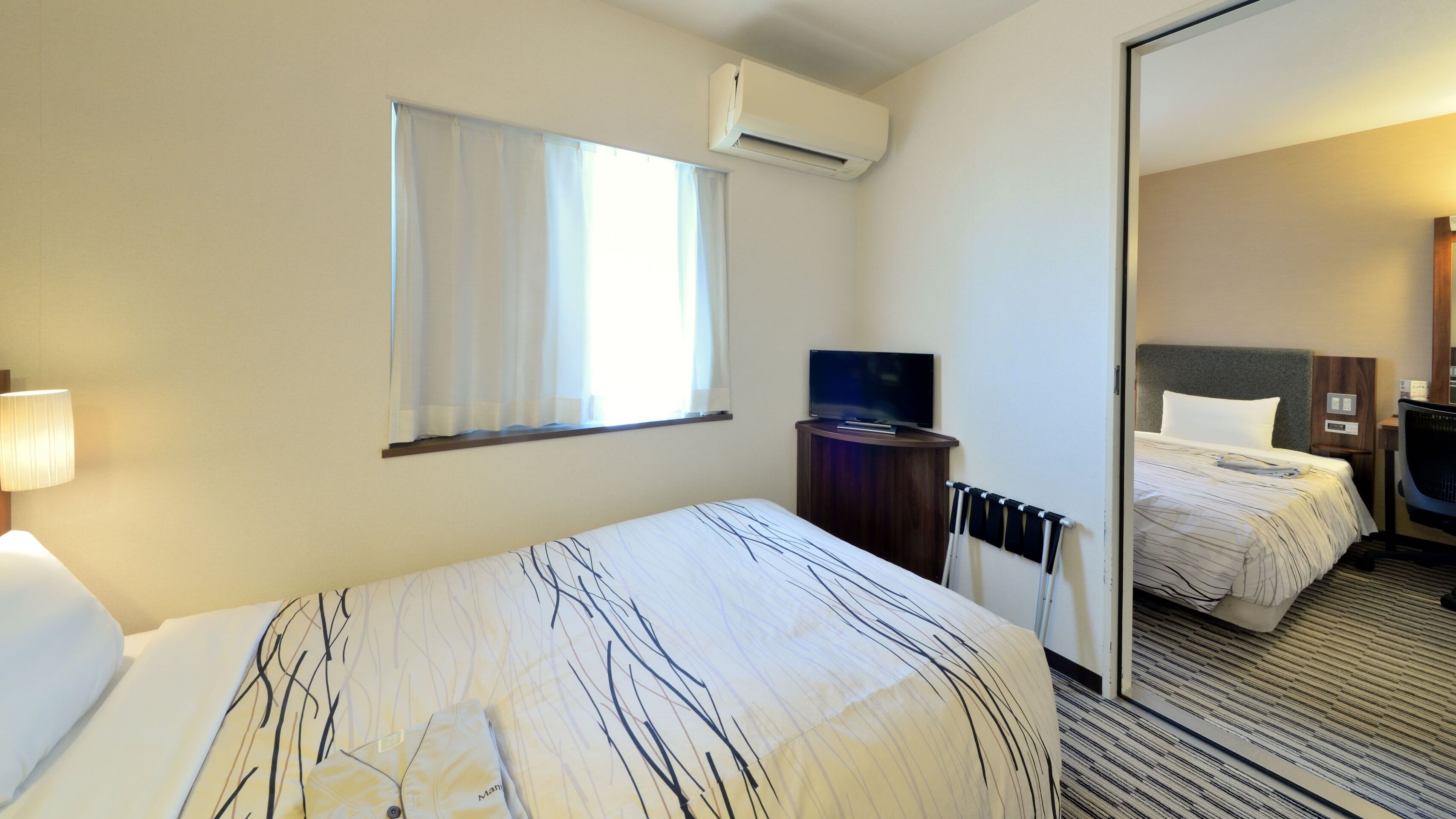 Desk, blackout curtains, free WiFi, bed sheets