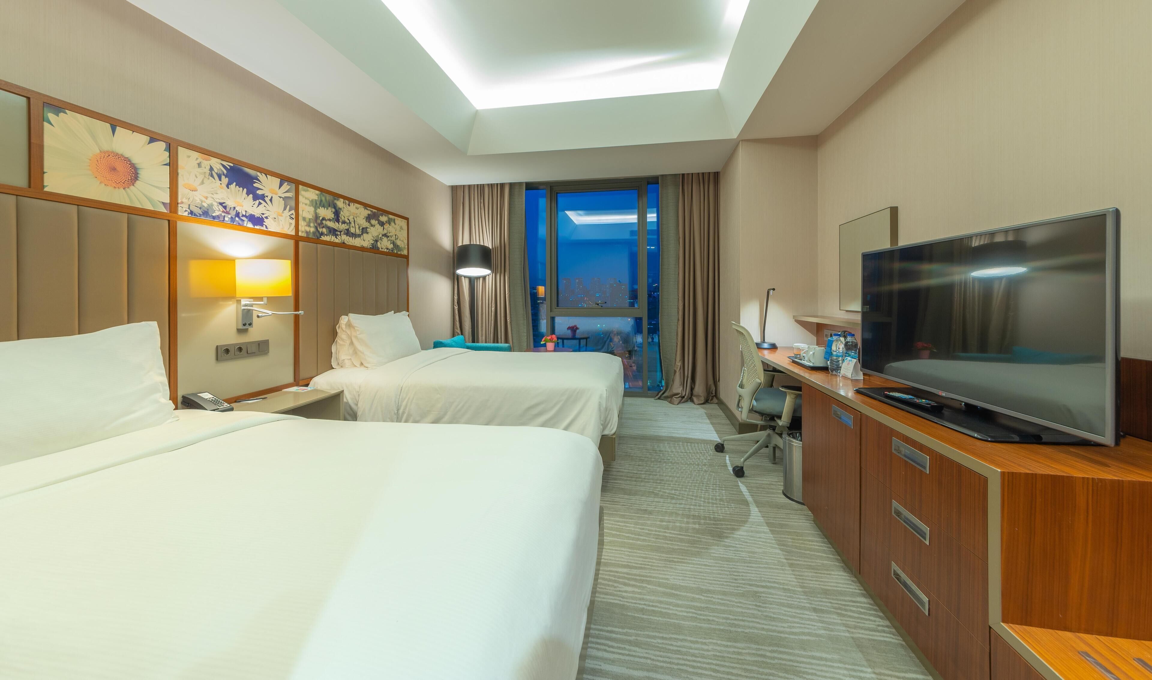 Habitación con 2 camas individuales, 2 camas individuales | Ropa de cama de alta calidad, minibar, caja fuerte y escritorio