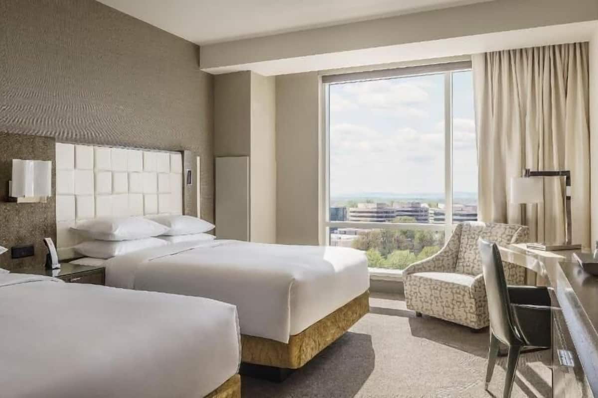 Premium bedding, down duvets, in-room safe, desk