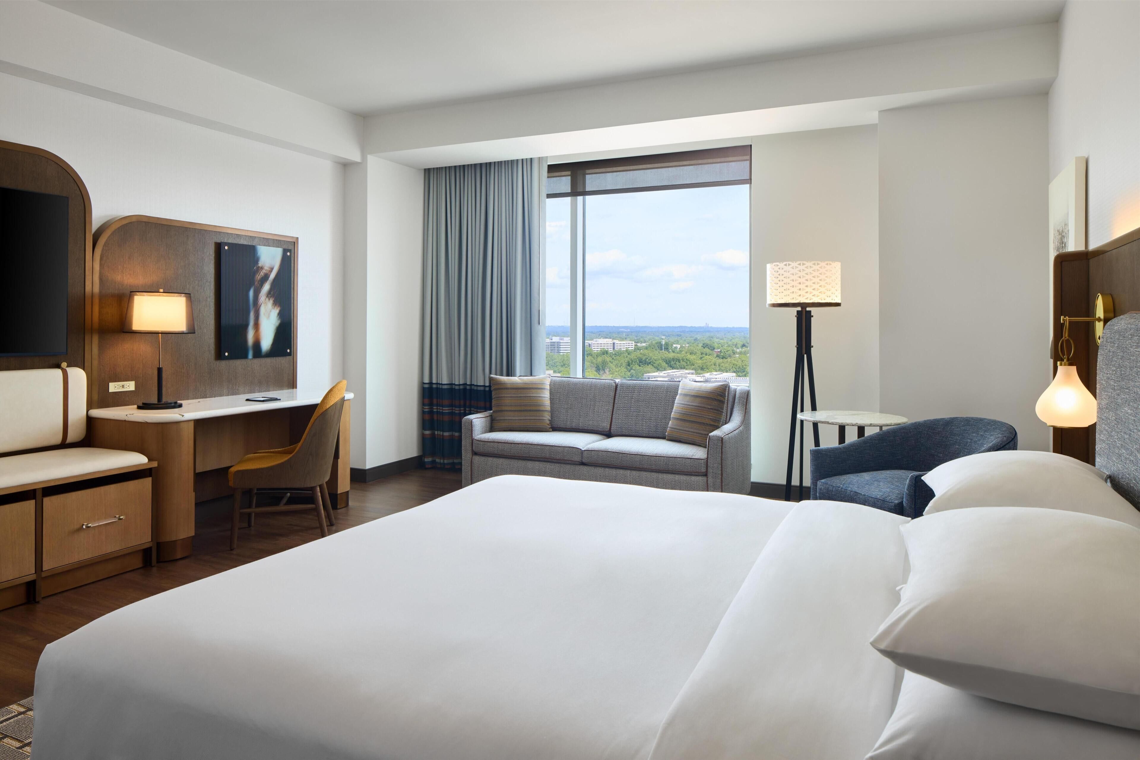 Premium bedding, down comforters, in-room safe, desk