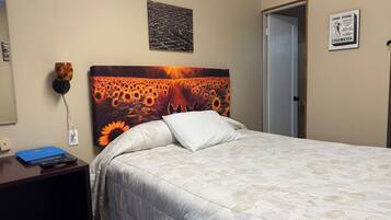 Room, 1 Queen Bed | Individually decorated, individually furnished, iron/ironing board