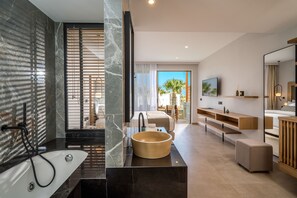 Room, Jetted Tub, Garden View | Bathroom | Bathtub, free toiletries, hair dryer, slippers