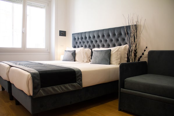 Comfort kamer, 1 twee- of 2 eenpersoonsbedden | Luxe beddengoed, donsdekens, een minibar, een kluis op de kamer