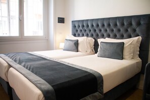 Dobbelt- eller tomannsrom – comfort | Sengetøy av topp kvalitet, dundyner, minibar og safe på rommet