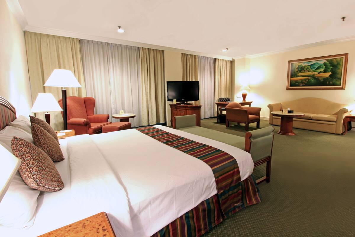In-room safe, desk, blackout curtains, iron/ironing board (on request)