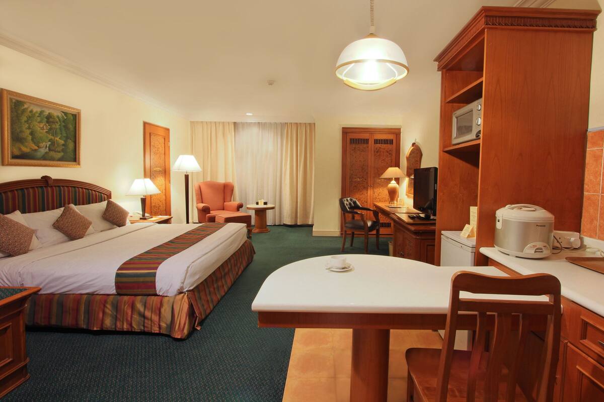 In-room safe, desk, blackout curtains, iron/ironing board (on request)