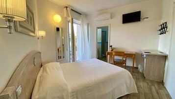 Habitación Deluxe doble | Caja fuerte, sistema de insonorización, cunas (de pago) y wifi gratis