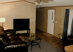 Suite, 2 Bedrooms, Kitchen | Living area - Eagle Ford Lodging (Pleasanton)