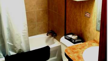 Suite, 2 Bedrooms, Kitchen | Bathroom | Combined shower/bathtub, free toiletries
