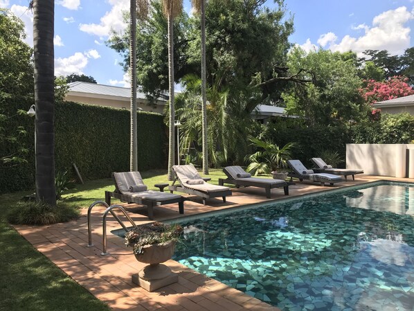 Outdoor pool, pool umbrellas, pool loungers