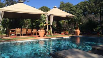 Outdoor pool, pool umbrellas, pool loungers
