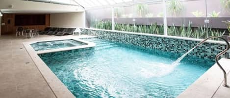 Indoor pool, sun loungers
