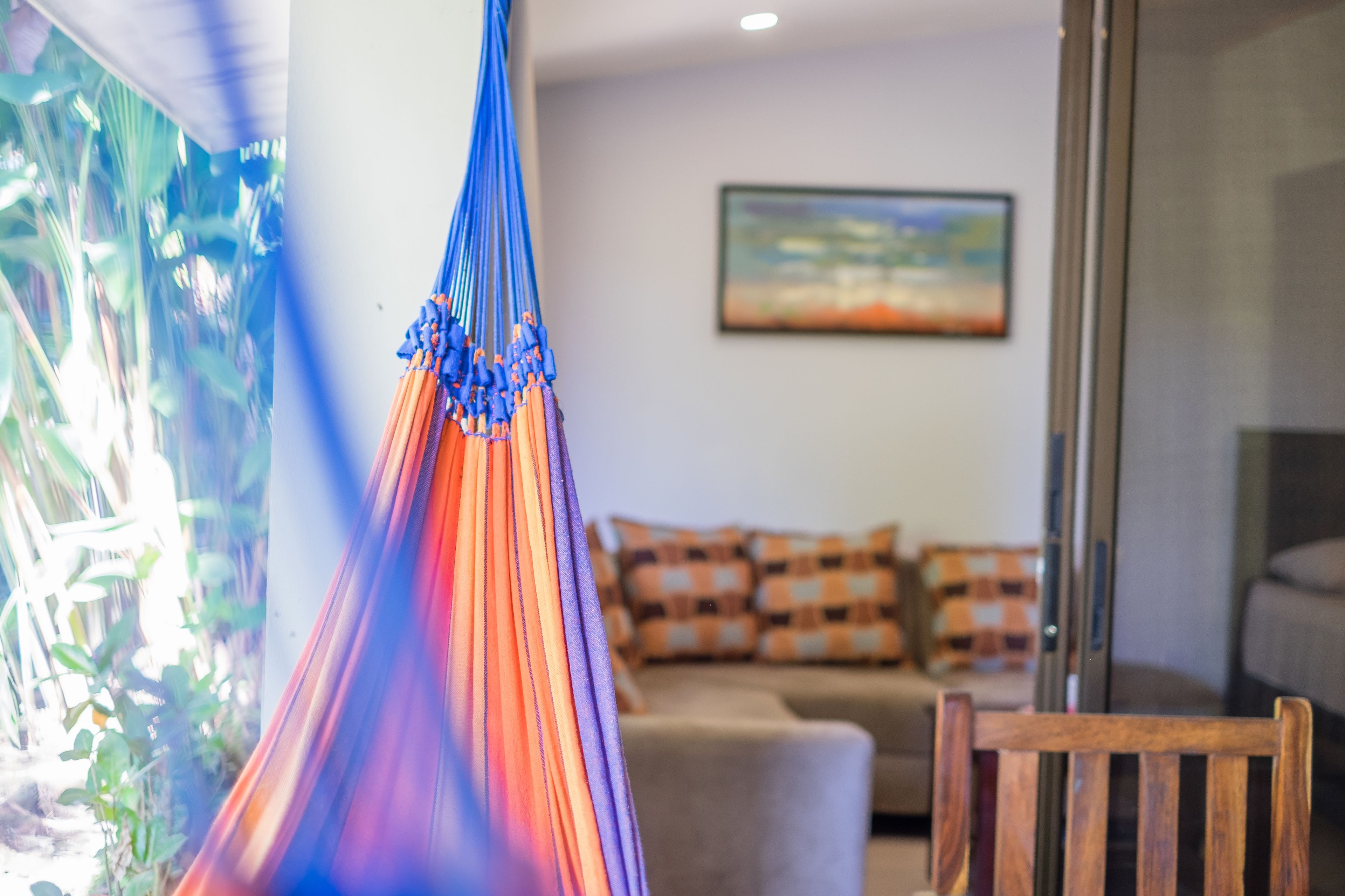 deluxe studio suite, multiple beds, garden view, poolside | terrace/patio